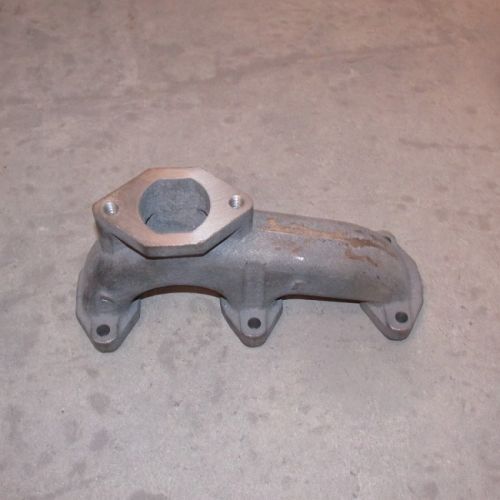 Колектор випускний KM385BT 2 отвори